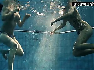 two spectacular amateurs showcasing their figures off under water