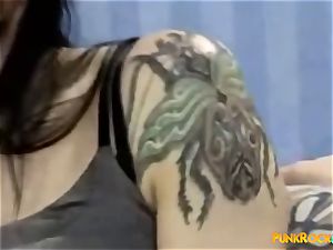 babe with lots of tattoos and piercing gets assfuck